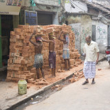 Carrying bricks to a site
